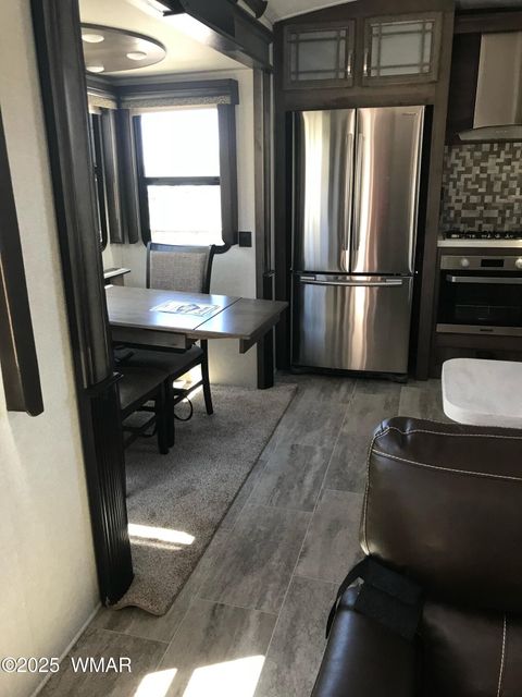 Tiny photo for 3881 S Mule Skinner Loop, Show Low, AZ 85901 (MLS # 260405)