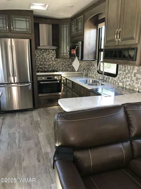 Tiny photo for 3881 S Mule Skinner Loop, Show Low, AZ 85901 (MLS # 260405)