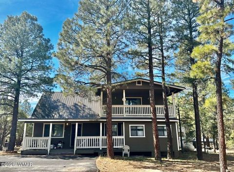 Photo of 2974 Wapiti Drive, Overgaard, AZ 85933 (MLS # 259944)