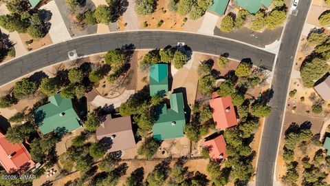 Tiny photo for 1991 N Covered Wagon Loop, Show Low, AZ 85901 (MLS # 259986)