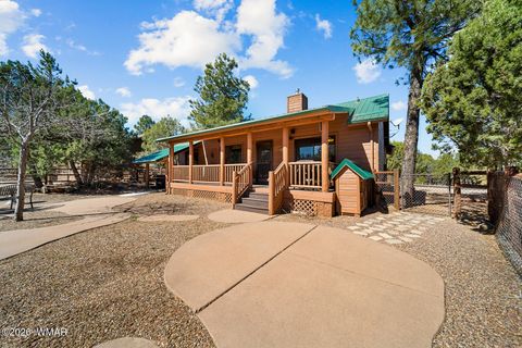 Tiny photo for 1991 N Covered Wagon Loop, Show Low, AZ 85901 (MLS # 259986)