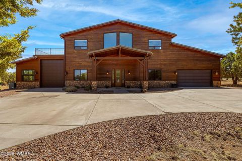 Photo of 2335 Voyager Circle, Overgaard, AZ 85933 (MLS # 255877)