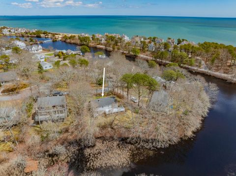 Photo of 21 Uncatena Road, Mashpee, MA 02649 (MLS # 22601899)
