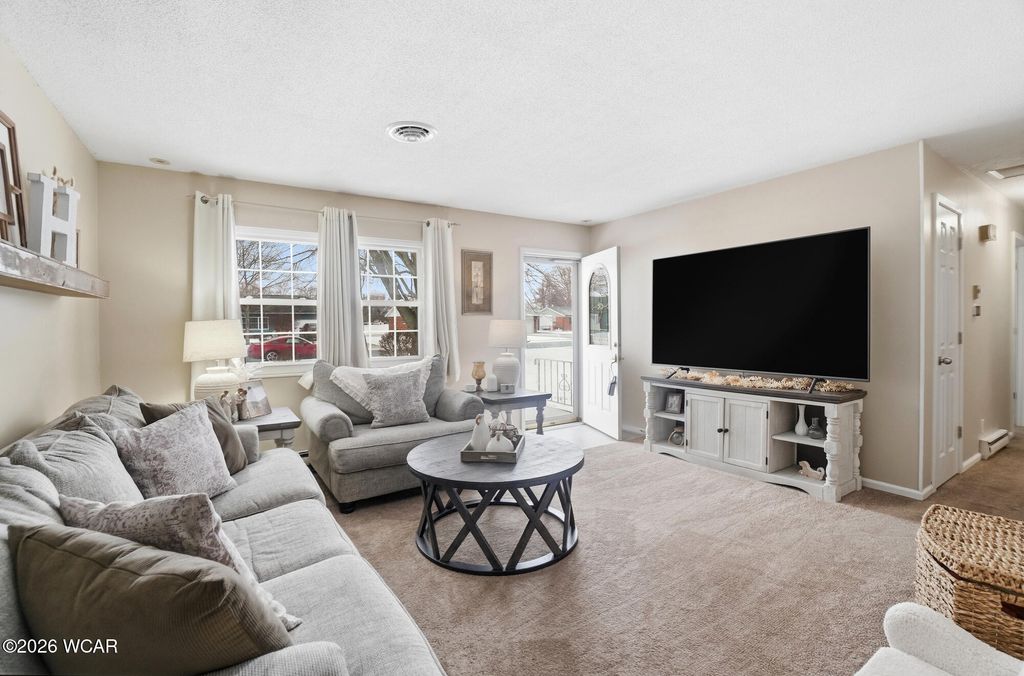 Photo of 821 Poppy Drive, Wapakoneta, OH 45895 (MLS # 309498)