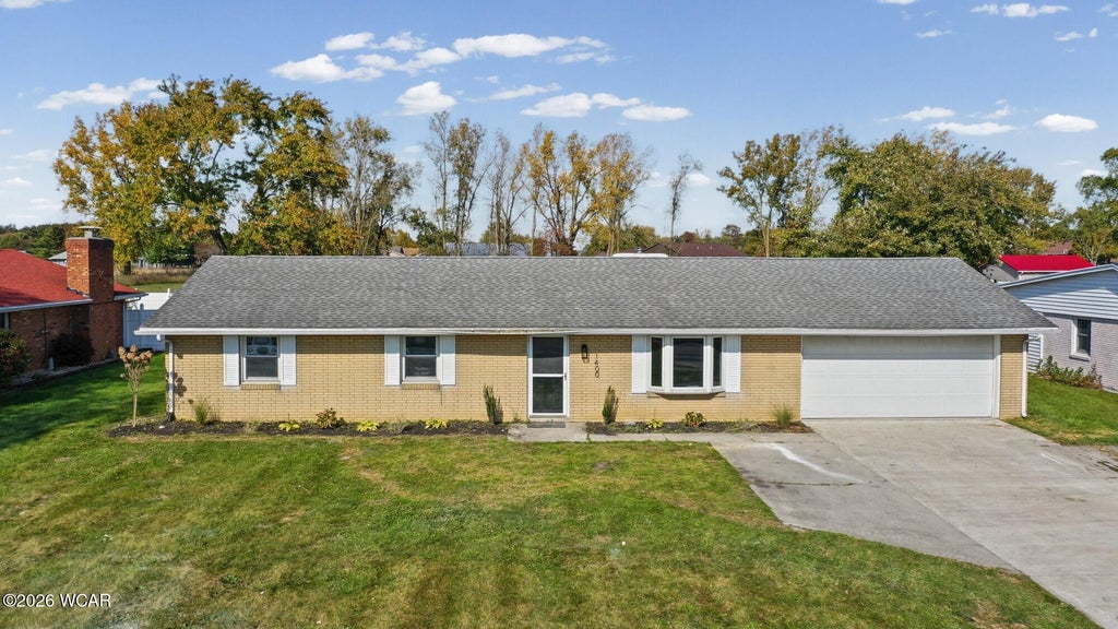 Photo of 1400 Edgewood Drive, Lima, OH 45805 (MLS # 312041)
