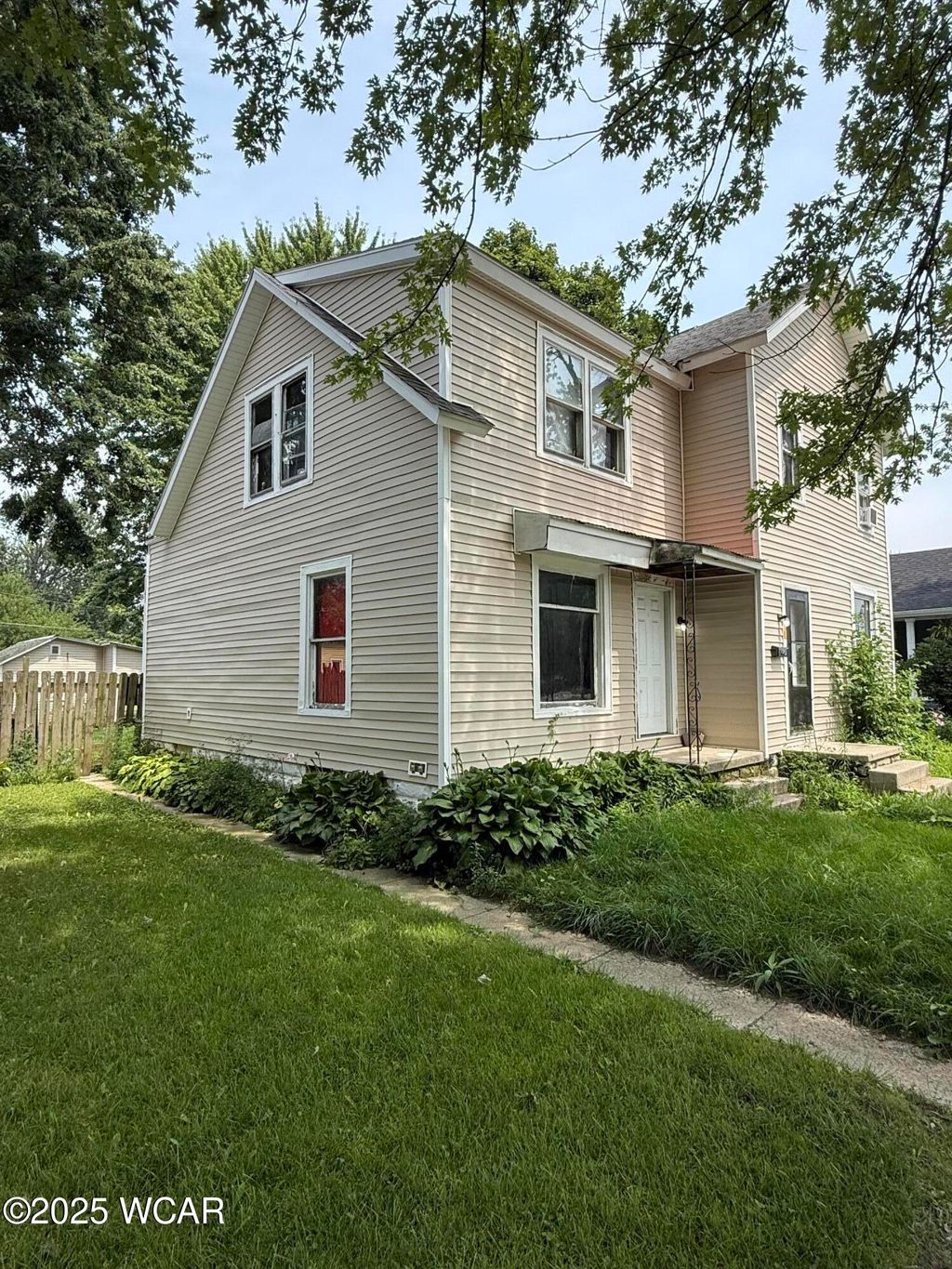 Photo of 306 E High st Street, Fostoria, OH 44830 (MLS # 308683)