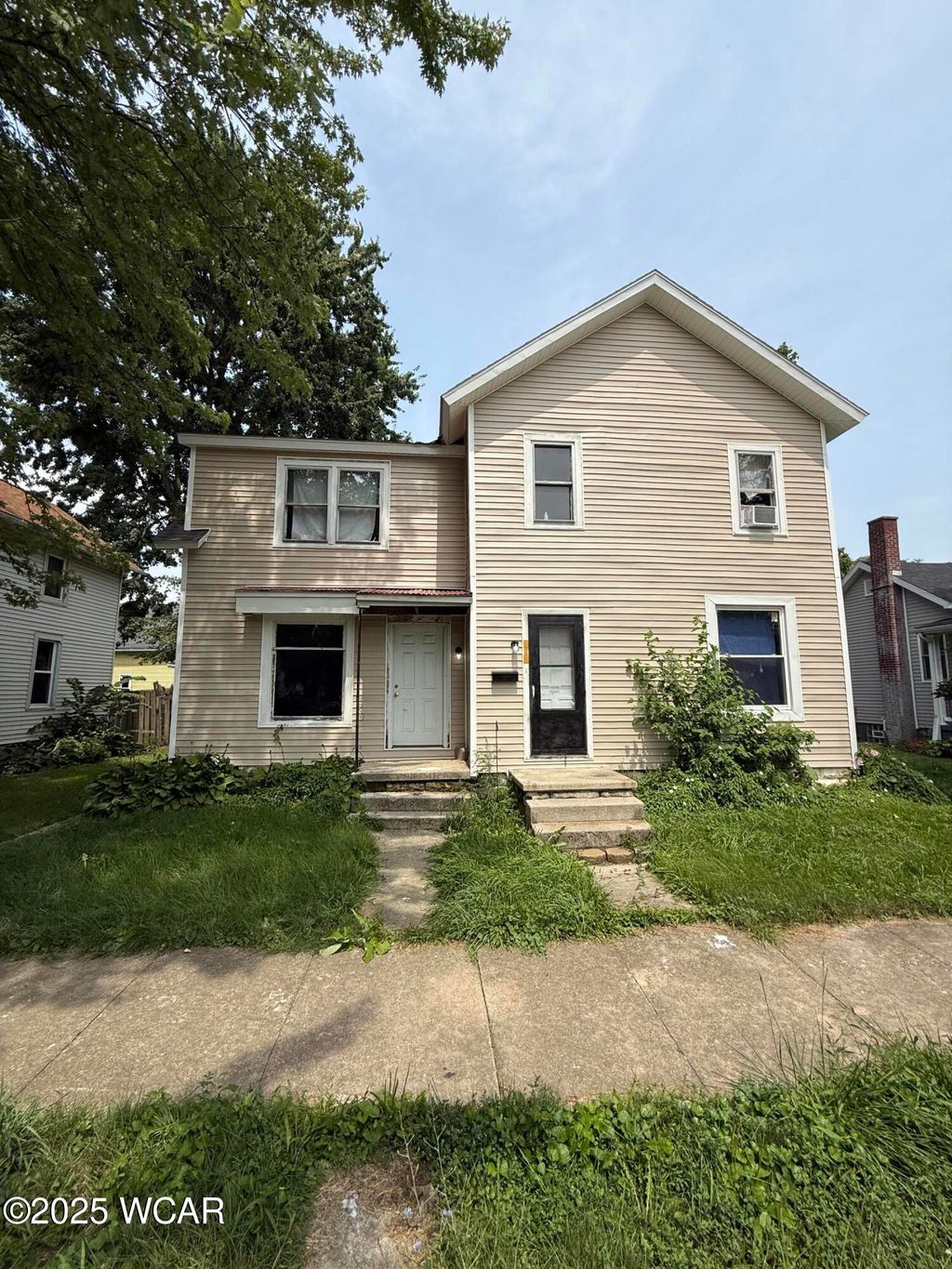 Photo of 306 E High st Street, Fostoria, OH 44830 (MLS # 308683)