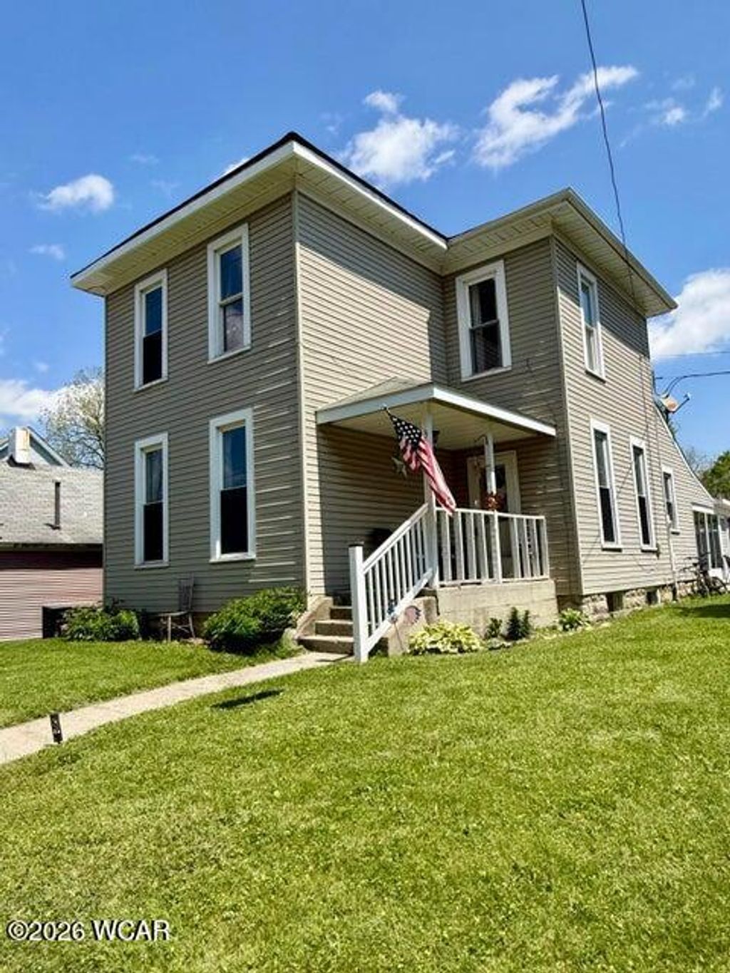 Photo of 313 Plumvalley Street, Bellefontaine, OH 43311 (MLS # 310155)