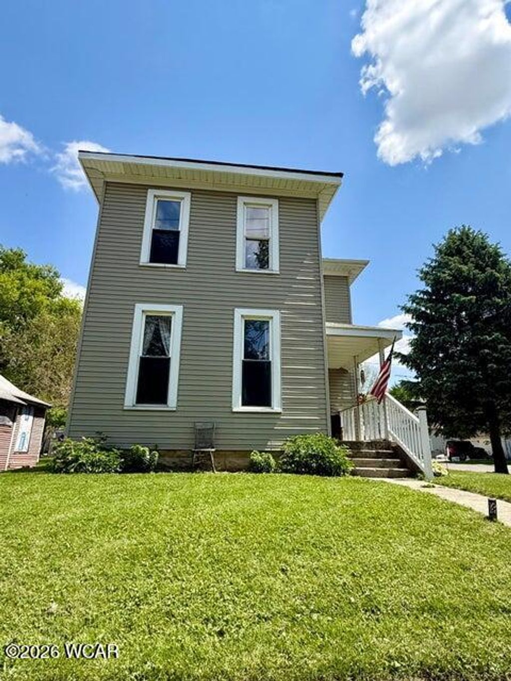 Photo of 313 Plumvalley Street, Bellefontaine, OH 43311 (MLS # 310155)