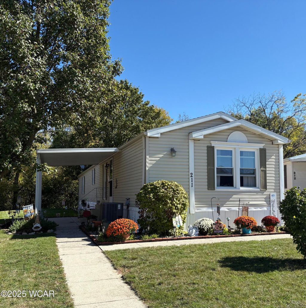 Photo of 211 Pinewood Circle, Lima, OH 45804 (MLS # 308544)