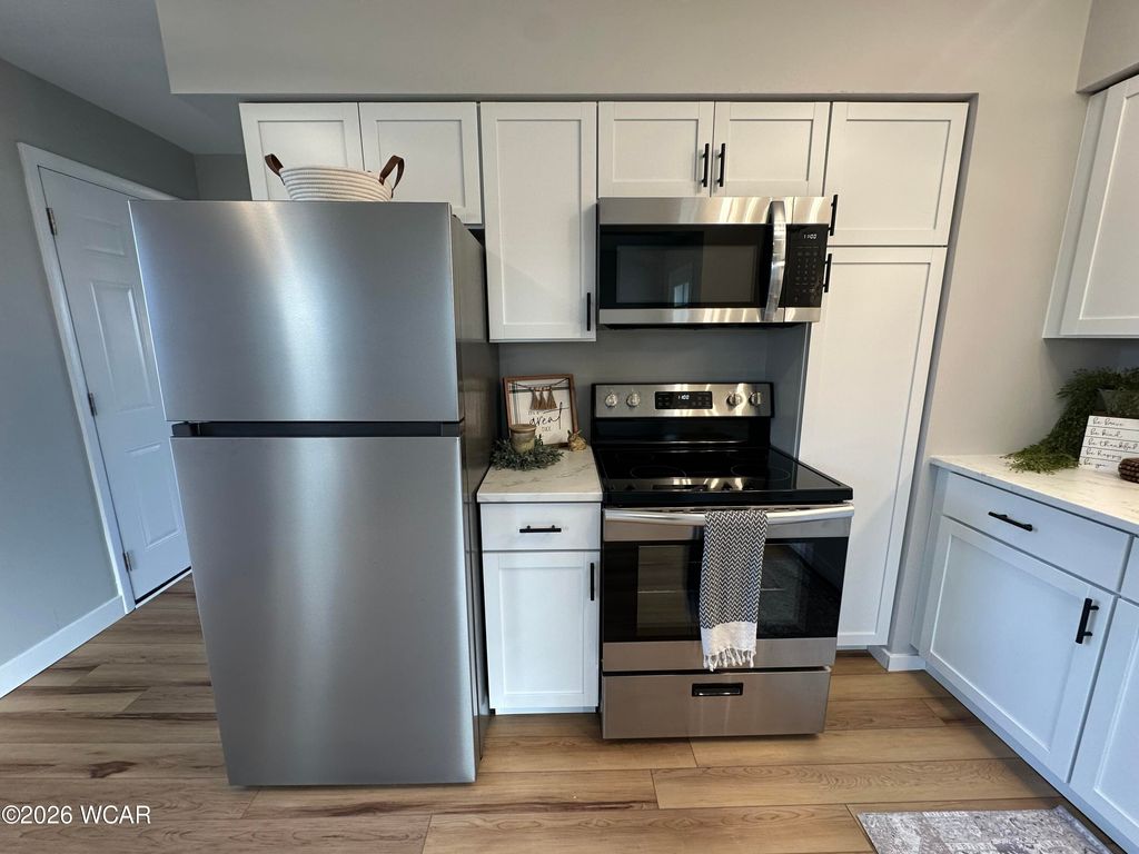 Photo of 128 E Lane Avenue, Lima, OH 45801 (MLS # 309163)