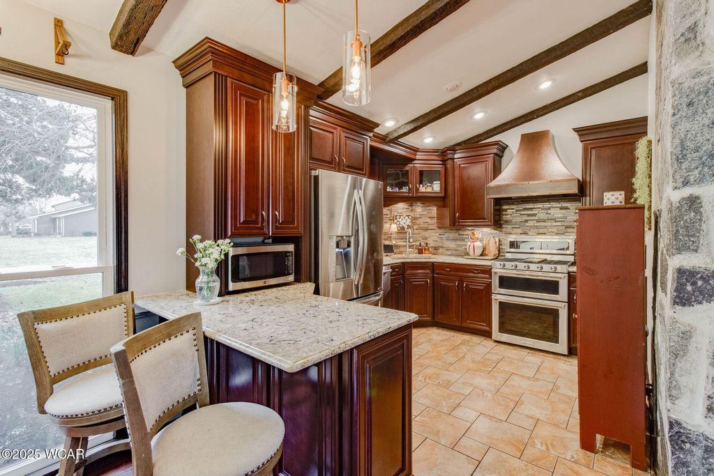 Photo of 4920 Tillamook Trail, Lima, OH 45805 (MLS # 309093)