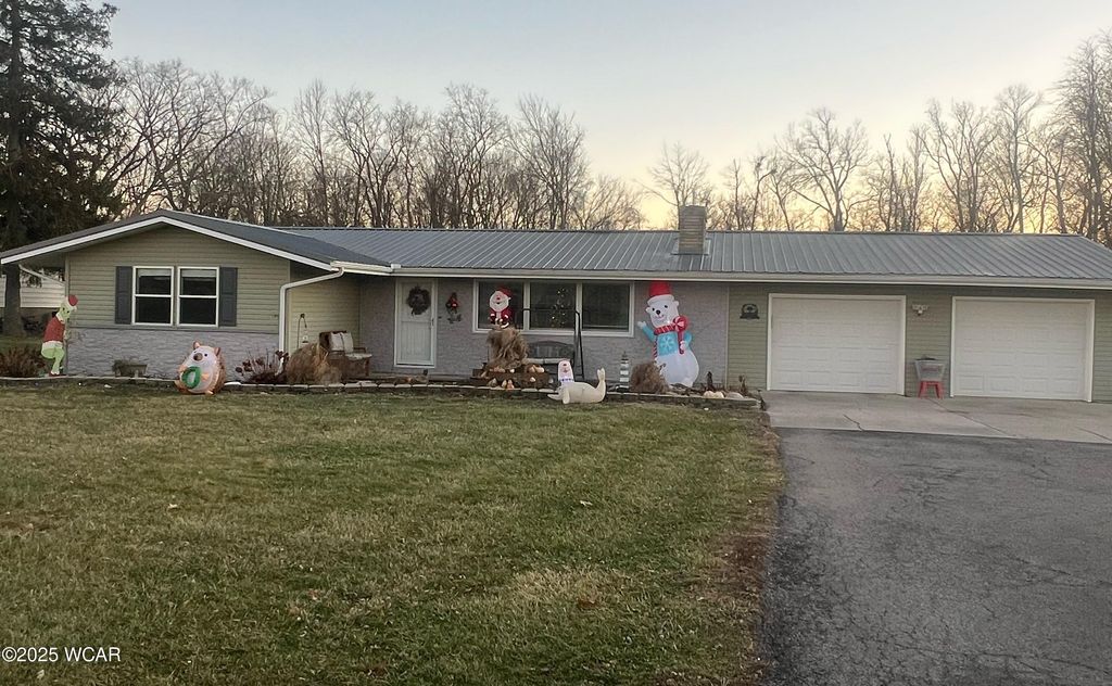 Photo of 5606 Reservoir Road, Lima, OH 45801 (MLS # 309080)