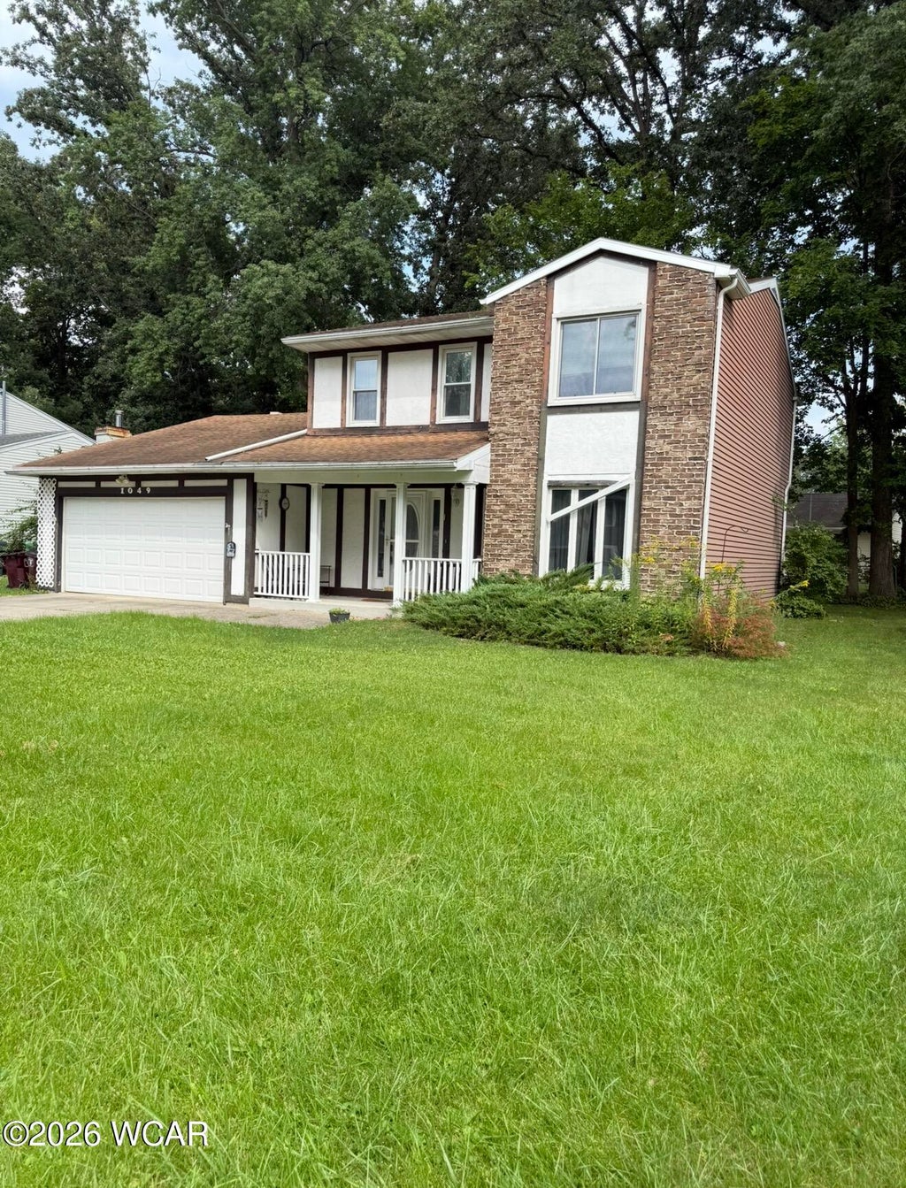 Photo of 1049 Westerly Drive, Lima, OH 45805 (MLS # 311432)