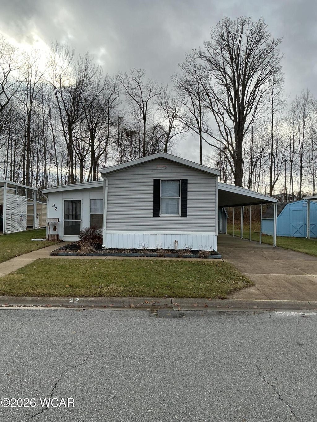 Photo of 32 Lakeside Drive, Lima, OH 45804 (MLS # 309177)