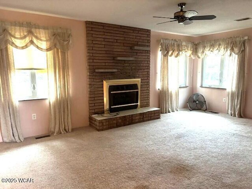 Photo of 105 GUTHRIE ST. Street, Waynesfield, OH 45896 (MLS # 308801)