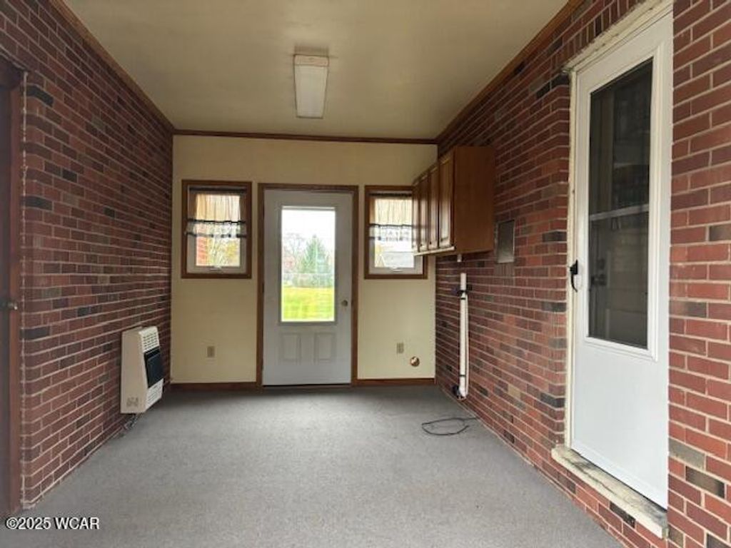 Photo of 105 GUTHRIE ST. Street, Waynesfield, OH 45896 (MLS # 308801)