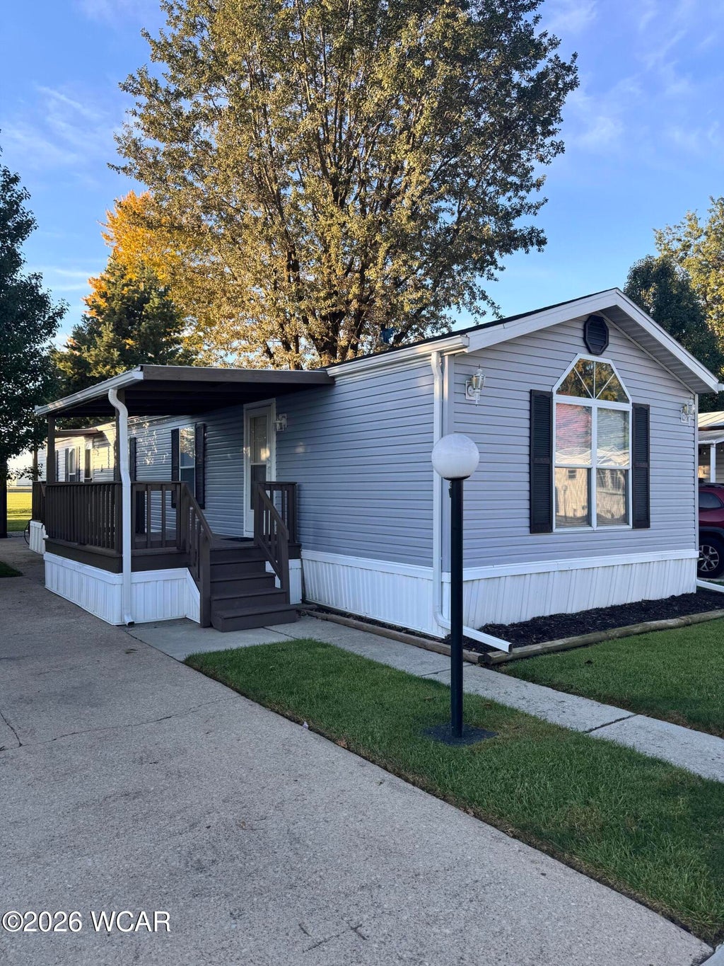 Photo of 9 Camelot Drive, Wapakoneta, OH 45895 (MLS # 312034)
