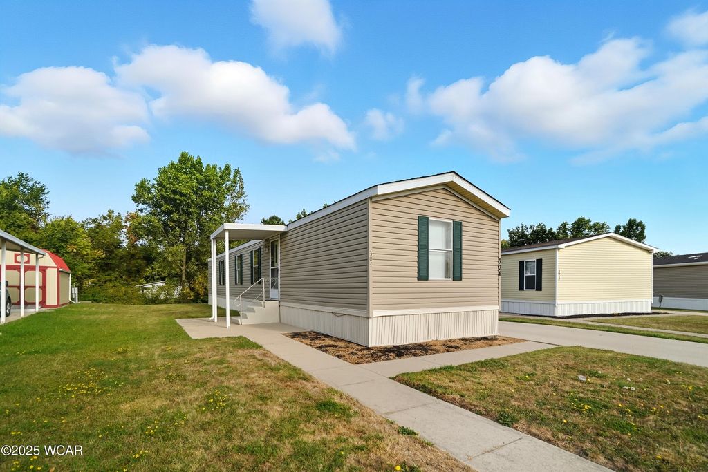 Photo of 304 Pinewood Circle, Lima, OH 45804 (MLS # 308230)