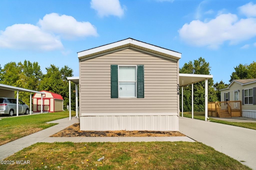 Photo of 304 Pinewood Circle, Lima, OH 45804 (MLS # 308230)