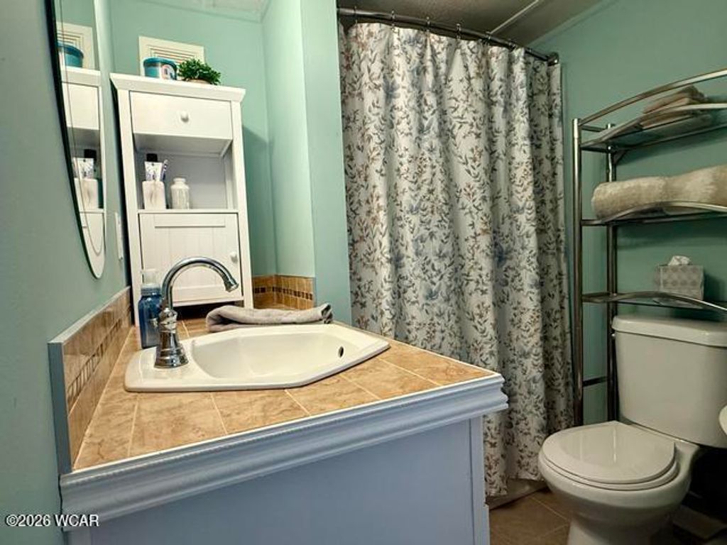 Photo of 285 N Orchard Island Road, Russells Point, OH 43348 (MLS # 309676)