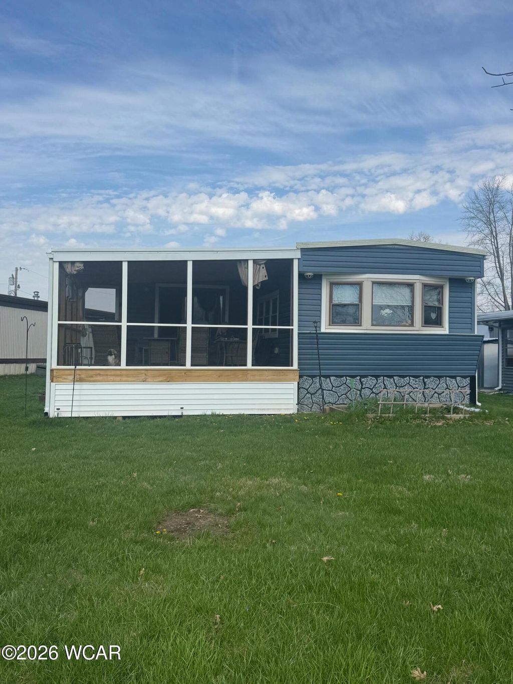 Photo of 8651 Ohio 368, Huntsville, OH 43324 (MLS # 309932)