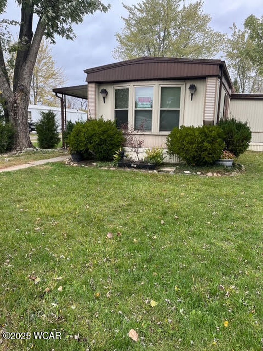 Photo of 301 Muskingum Trail, Lima, OH 45806 (MLS # 308913)