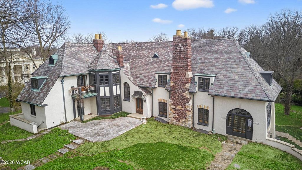 Photo of 999 Harman Avenue, Oakwood, OH 45419 (MLS # 309900)