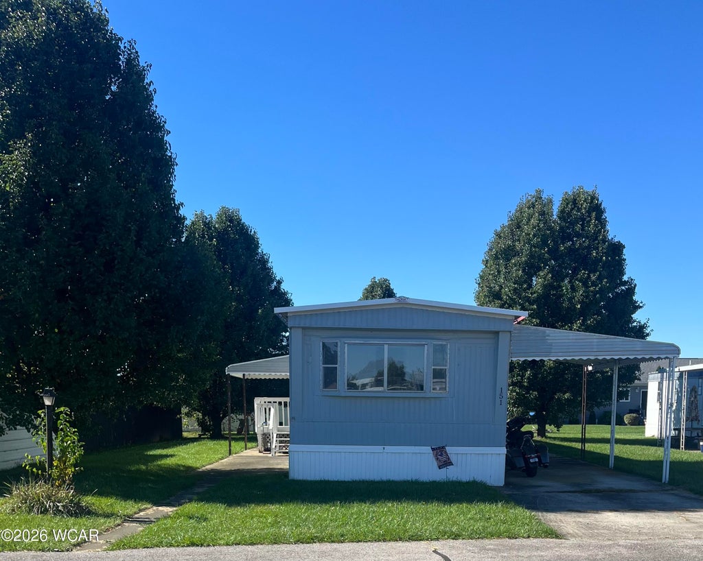 Photo of 151 Winterhaven Drive, Wapakoneta, OH 45895 (MLS # 311957)