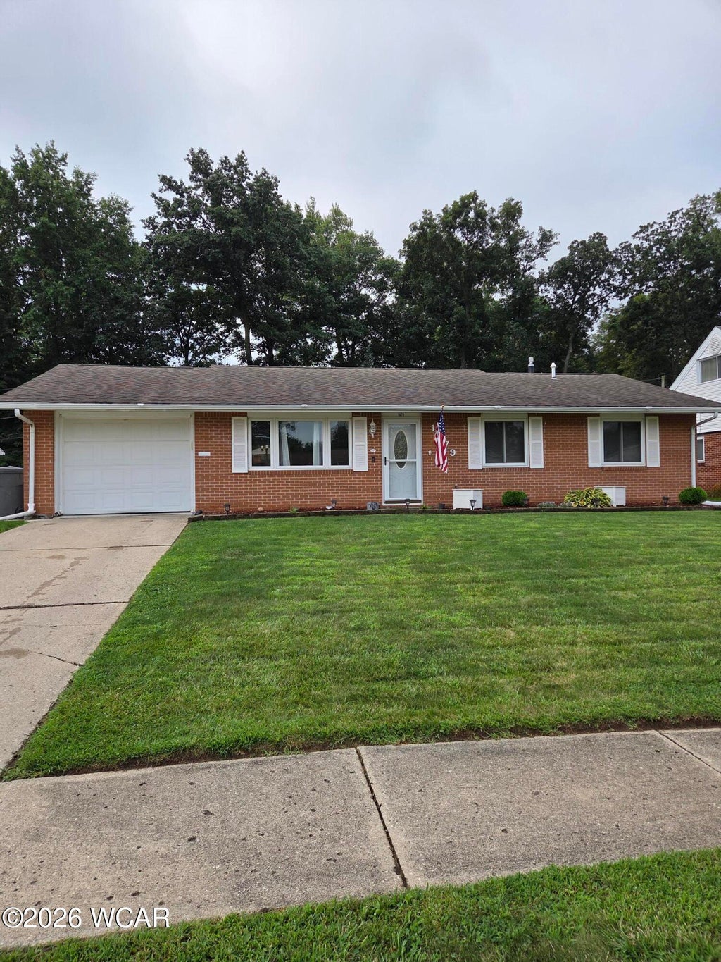 Photo of 1679 Rebecca Drive, Lima, OH 45805 (MLS # 311123)