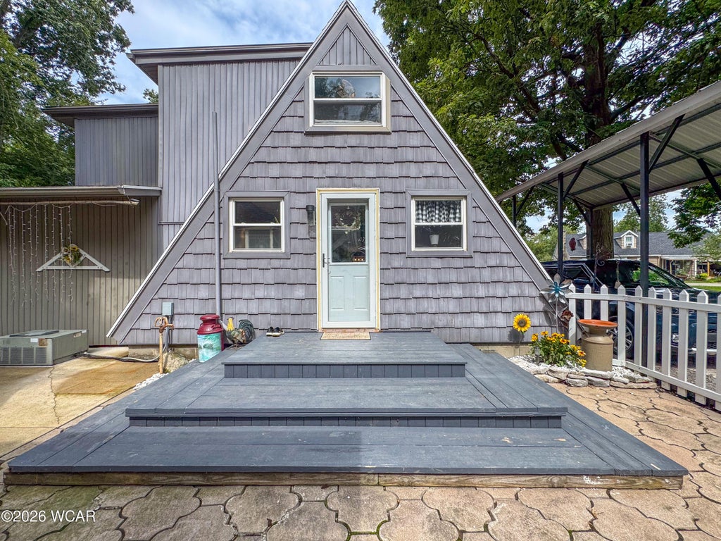 Photo of 10731 Piqua Drive, Huntsville, OH 43324 (MLS # 311577)
