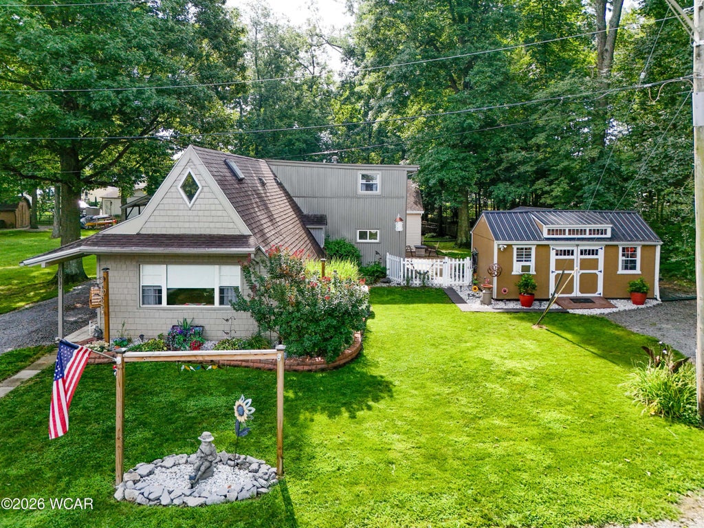 Photo of 10731 Piqua Drive, Huntsville, OH 43324 (MLS # 311577)