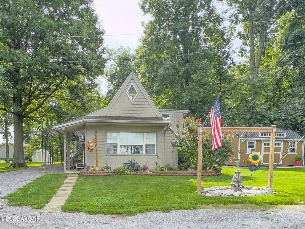 Photo of 10731 Piqua Drive, Huntsville, OH 43324 (MLS # 311577)