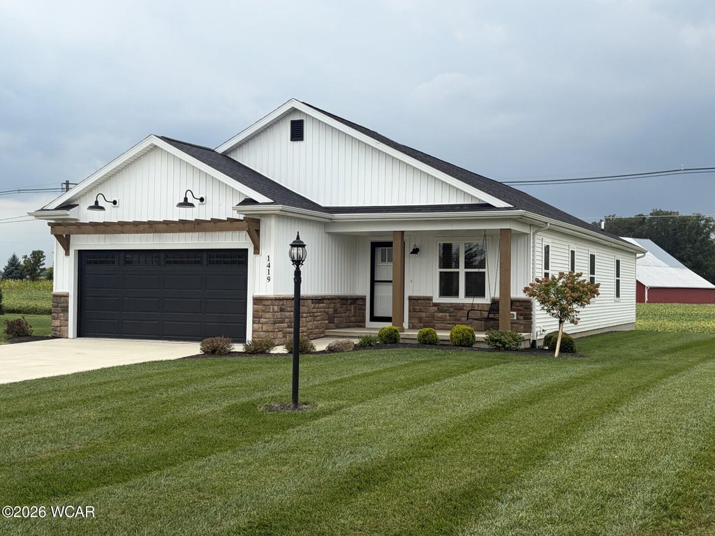 Photo of 1419 Madison Place, Wapakoneta, OH 45895 (MLS # 311585)