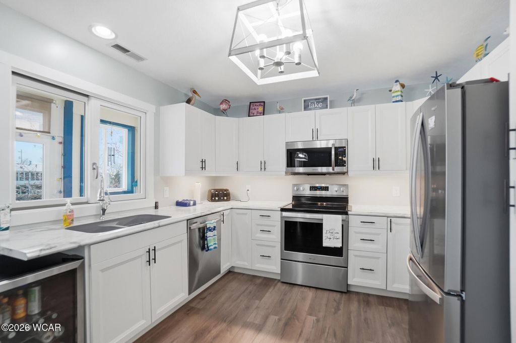 Photo of 241 Chase Avenue, Russells Point, OH 43348 (MLS # 309771)