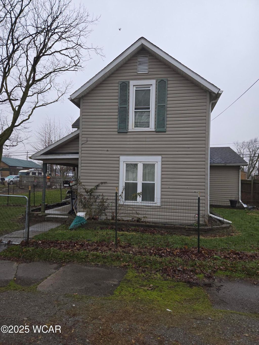 Photo of 303 N Front Street, Alger, OH 45812 (MLS # 309101)