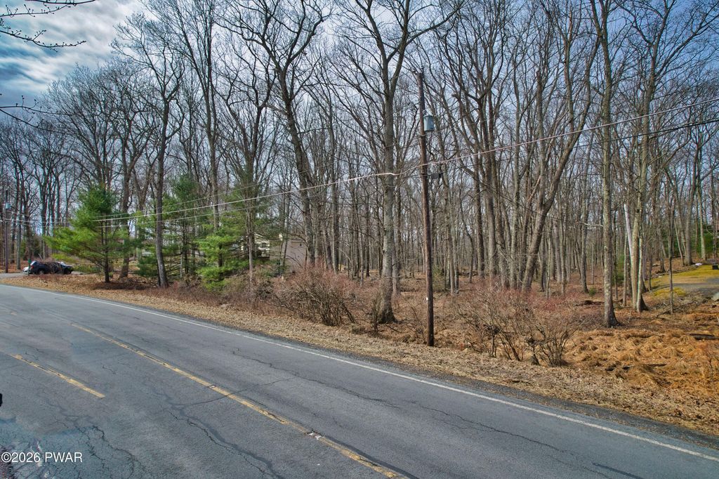 Photo of 300 Maple Ridge Drive, Hawley, PA 18428 (MLS # PW260946)