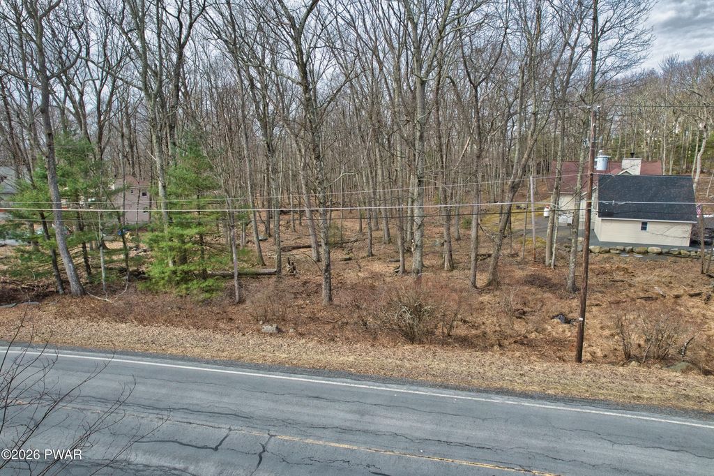 Photo of 300 Maple Ridge Drive, Hawley, PA 18428 (MLS # PW260946)