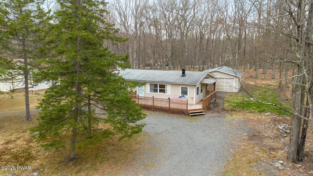 Photo of 136 Buckhorn Drive, Hawley, PA 18428 (MLS # PW260932)