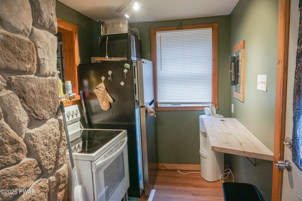 Photo of 223 Five Mile Meadow Road, Dingmans Ferry, PA 18328 (MLS # PW260993)