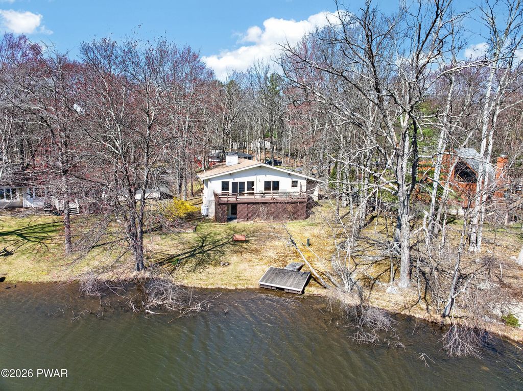 Photo of 142 Beech Road, Dingmans Ferry, PA 18328 (MLS # PW260952)