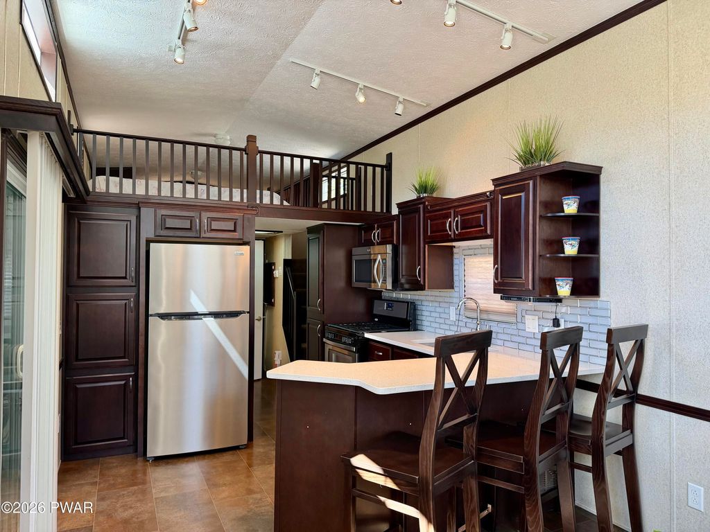 Photo of 213 Tribes Drive, Shohola, PA 18458 (MLS # PW260863)