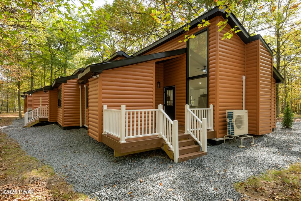 Photo of 120 Twin Rivers Road, Lackawaxen, PA 18435 (MLS # PW253338)