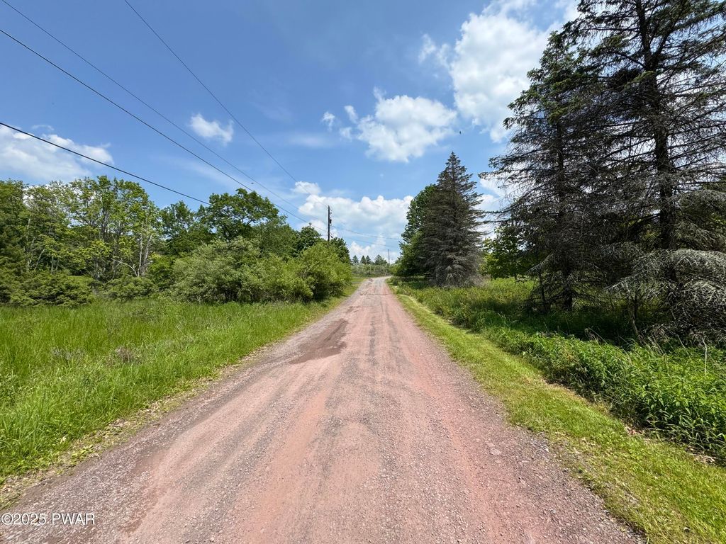 Photo of 35 Rosewood Lane, Lackawaxen, PA 18435 (MLS # PW252074)