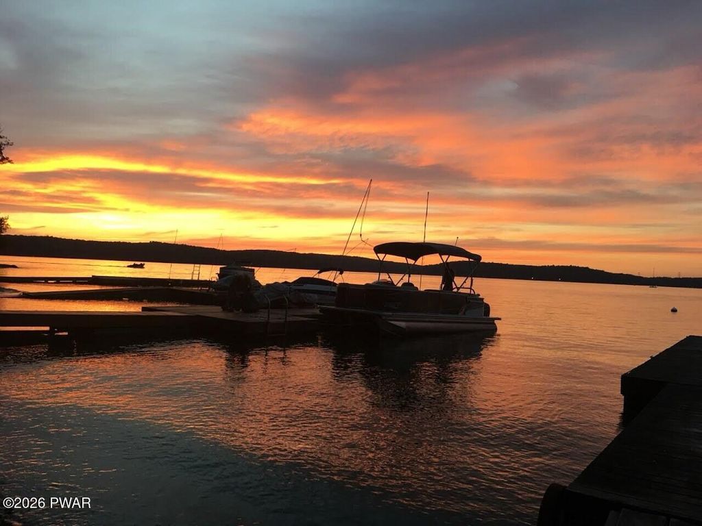 Photo of 325 Sunset Shore Drive, Hawley, PA 18428 (MLS # PW260794)