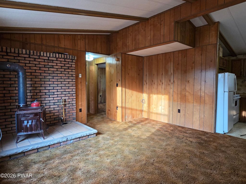 Photo of 107 Highland Trail, Pleasant Mount, PA 18453 (MLS # PW260774)