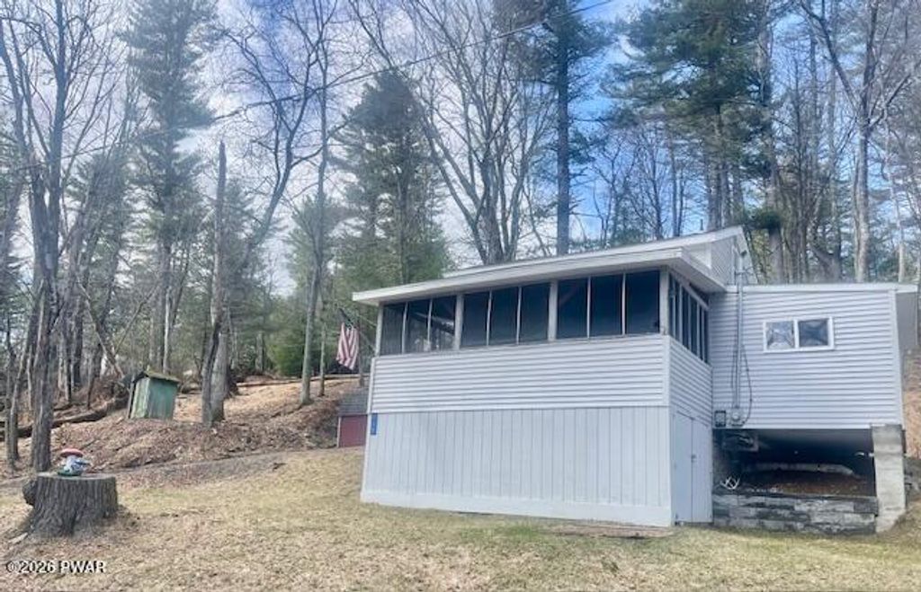Photo of 112 Maurauder Lane, Dingmans Ferry, PA 18328 (MLS # PW260616)