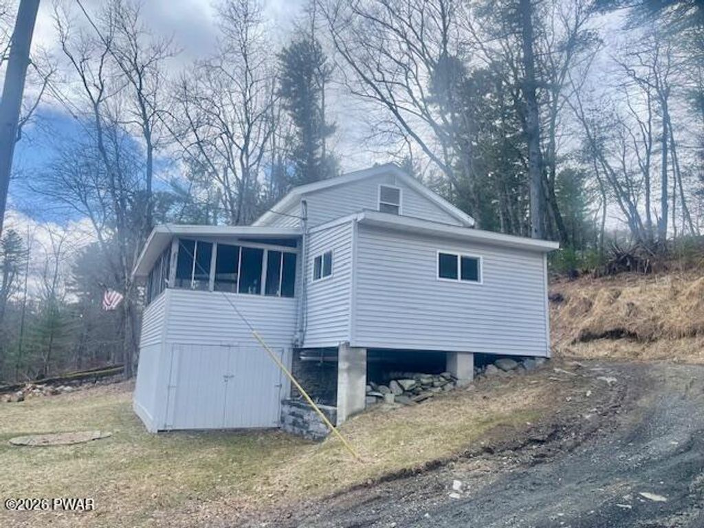 Photo of 112 Maurauder Lane, Dingmans Ferry, PA 18328 (MLS # PW260616)