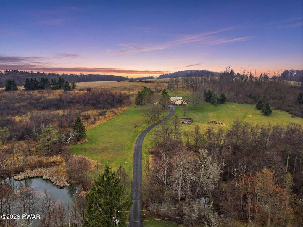 Photo of 421 W Abington Road, Dalton, PA 18414 (MLS # PW260878)