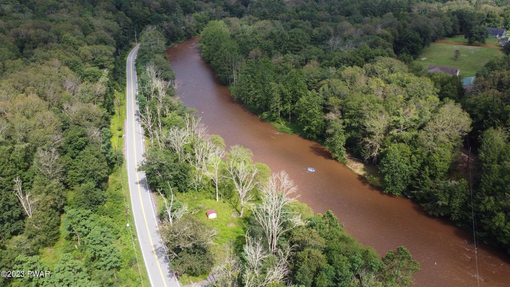 Photo of 142 Mountain Top Road, Lackawaxen, PA 18435 (MLS # PW251552)